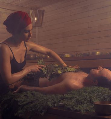 An Ayurvedic therapist giving a relaxing massage to a man, promoting holistic healing and rejuvenation.