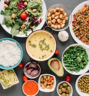 A selection of healthy foods and a diet plan representing customized holistic wellness plans for balanced nutrition and vitality